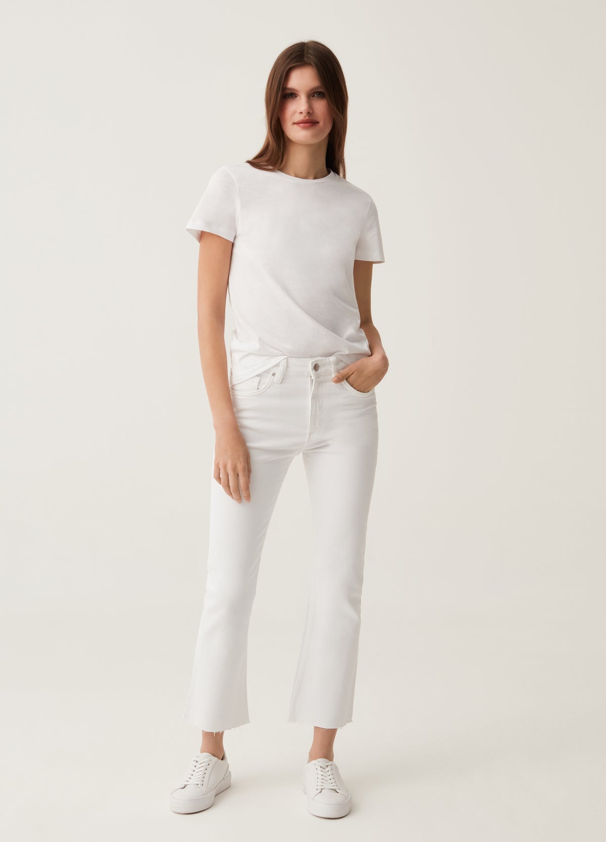 Flare-fit jeans with raw edging