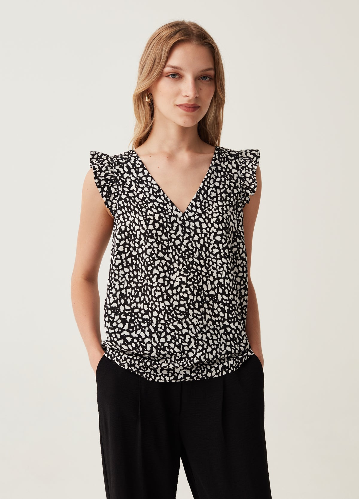 Blouse with patterned flounce