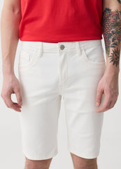 Slim-fit Bermuda shorts in solid colour denim