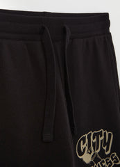 Fleece joggers with drawstring and print