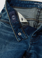 Slim-fit jeans with five pockets and ''Varsity'' print