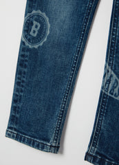 Slim-fit jeans with five pockets and ''Varsity'' print